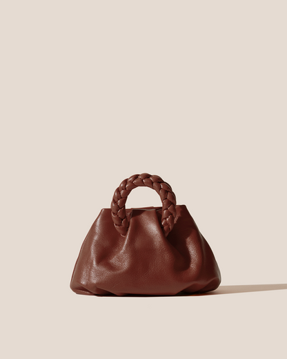 BOMBON SUPPLE SHINY - Plaited-handle Leather Handbag - Hereu US