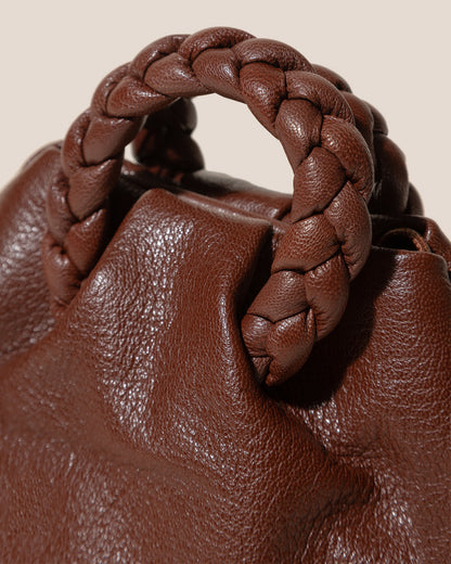 BOMBON SUPPLE SHINY - Plaited-handle Leather Handbag - Hereu US