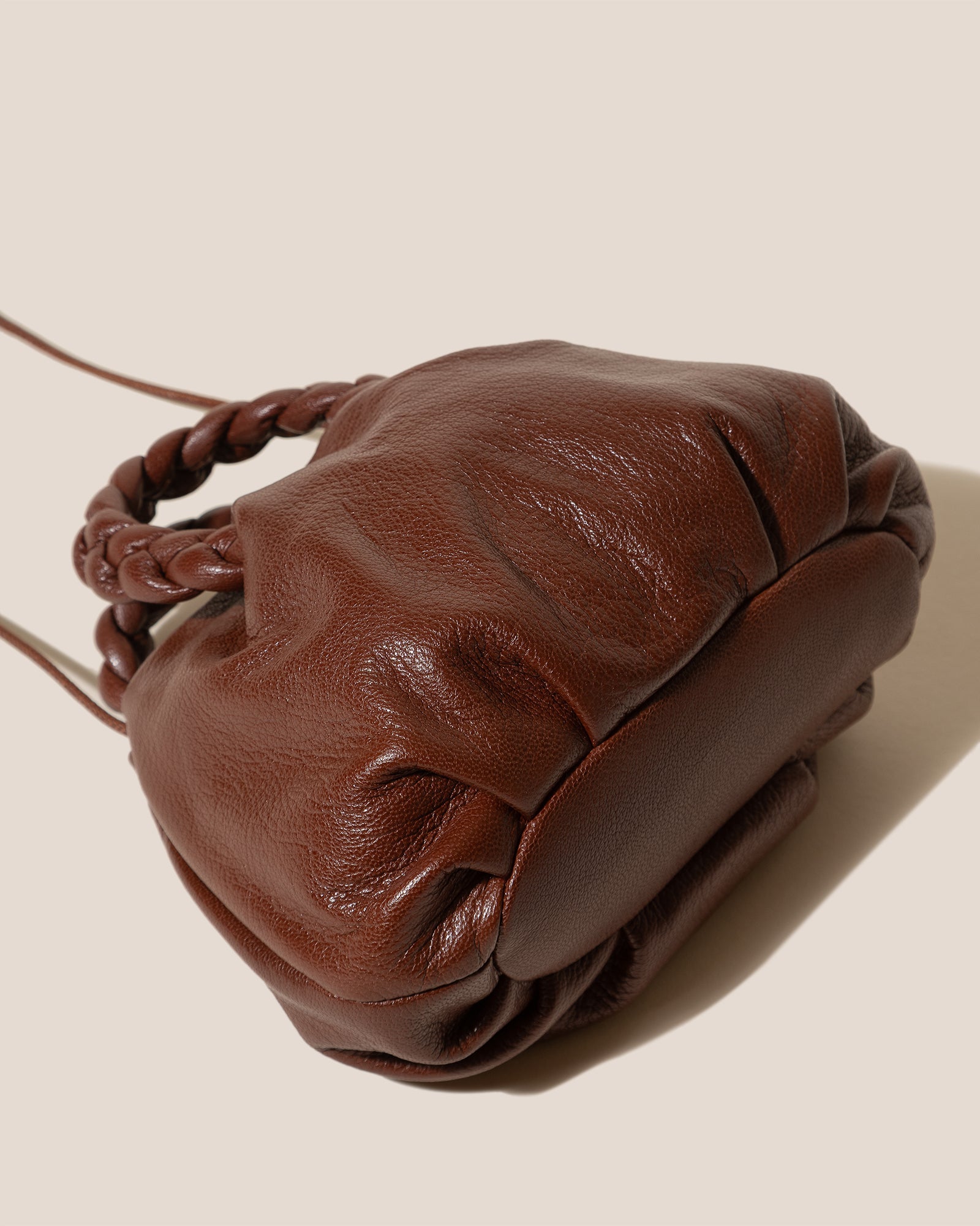 BOMBON SUPPLE SHINY - Plaited-handle Leather Handbag - Hereu US