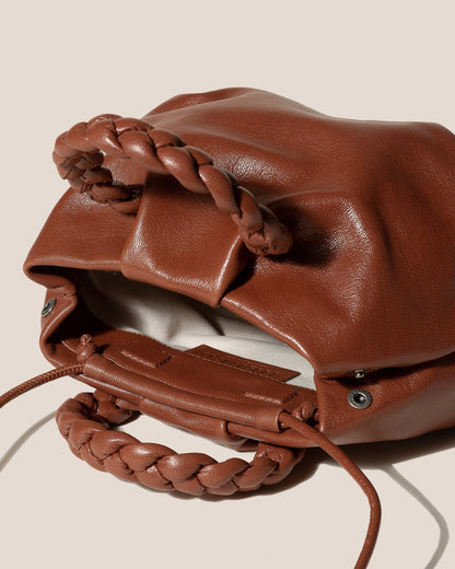 BOMBON M SUPPLE SHINY - Medium Plaited-handle Leather Handbag - Hereu outlet