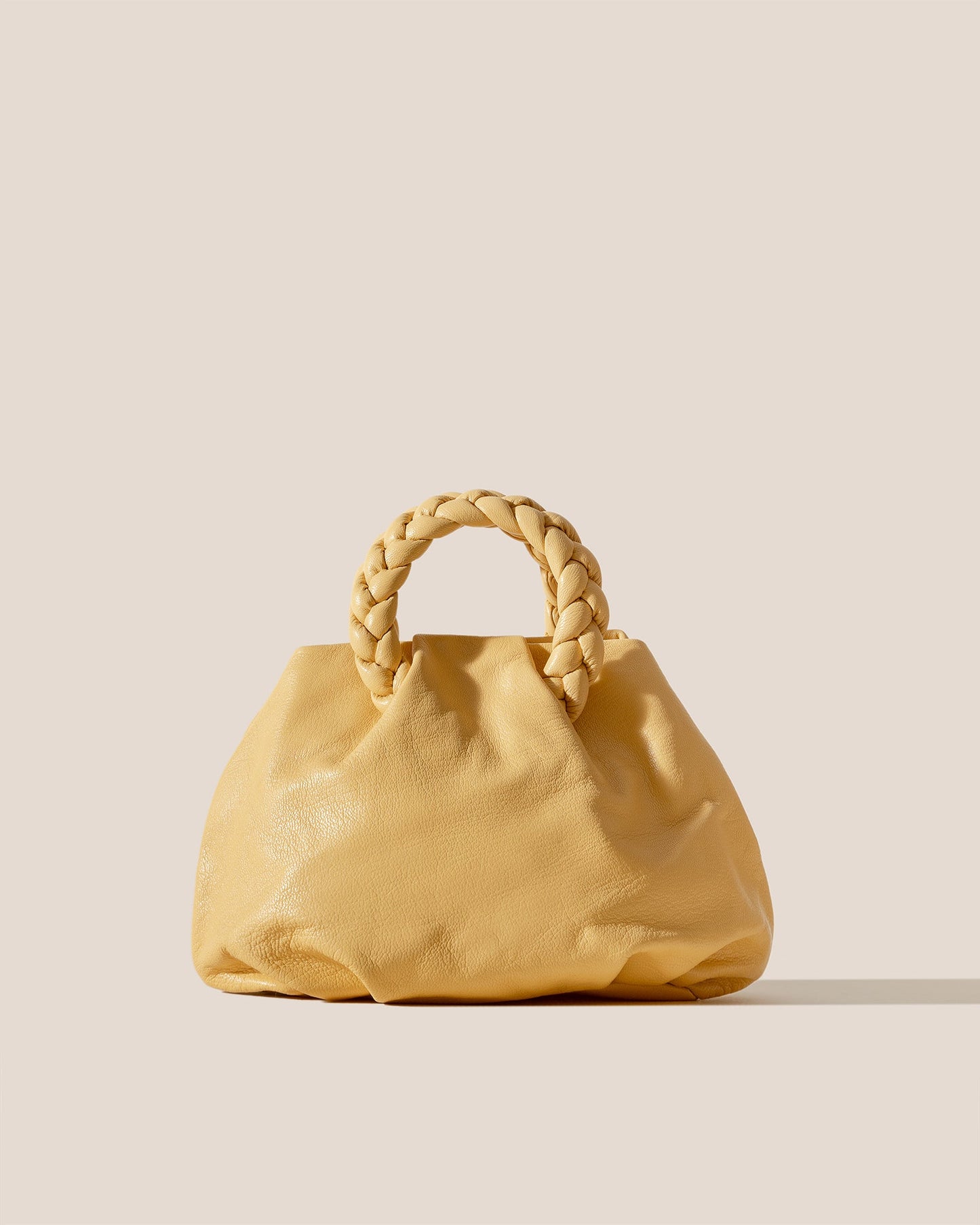 BOMBON M SUPPLE SHINY - Medium Plaited-handle Leather Handbag - Hereu online