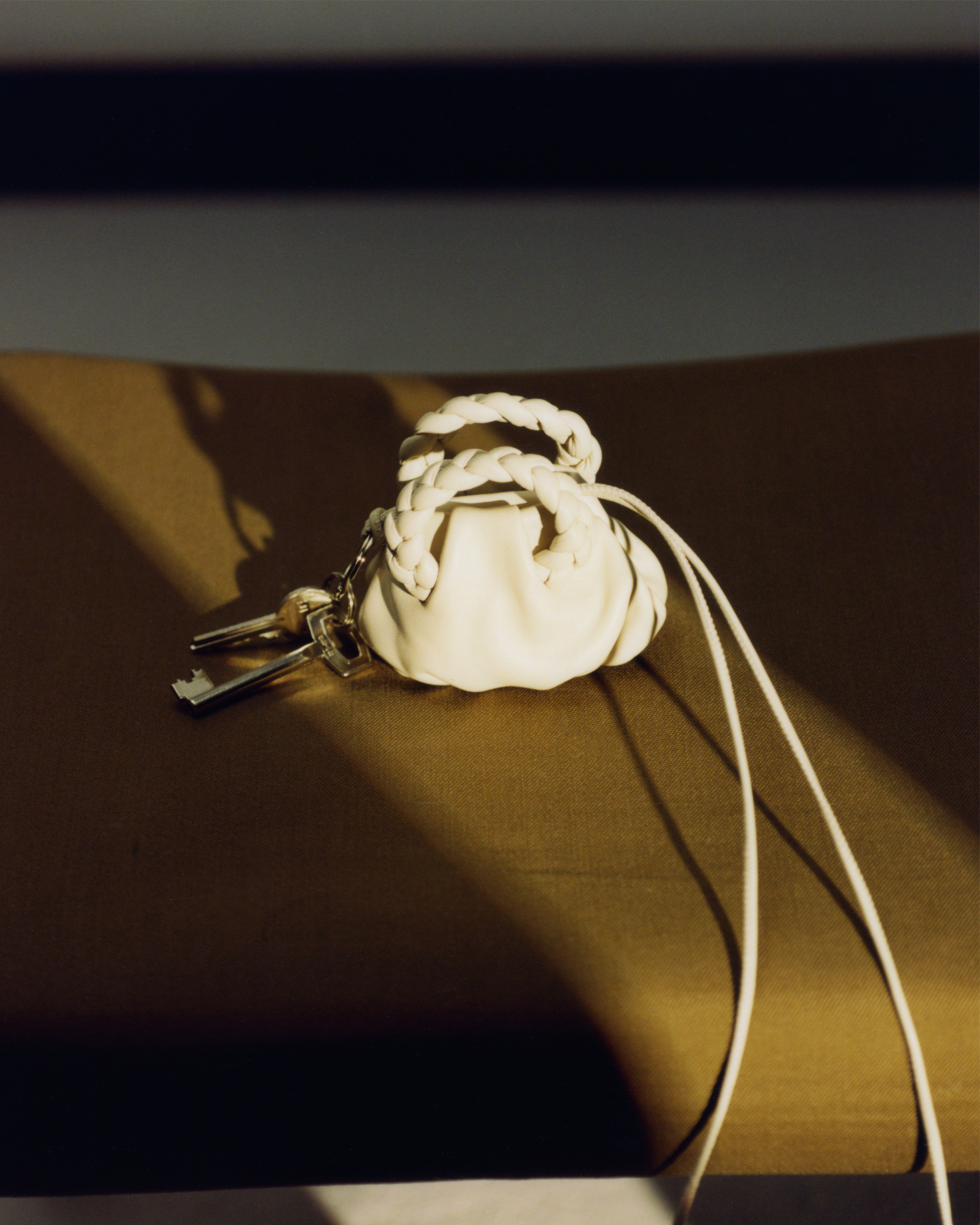 BOMBON MINI PURSE - Plaited-Handle Leather Keychain Purse - Hereu for sale